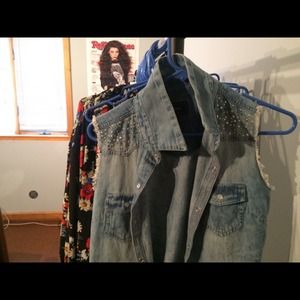 Denim sleeveless jacket with rhinestone detailing!