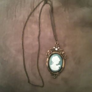 Vintage woman with baby necklace