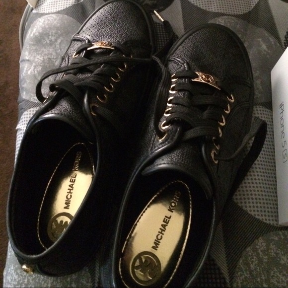 Only used once black & gold original Mk shoes