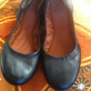 Black leather "lucky" flats