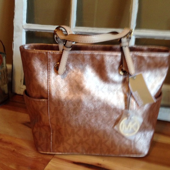 Brand new never used Michael Kors Rose Gold Tote