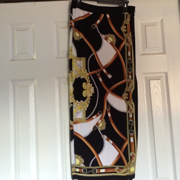 Cache beautiful print boot skirt for holidays.