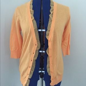 light orange cardigan