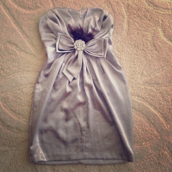Silver cocktail dress with super glam brooch!