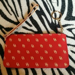 NEW LISTING!  Like NEW  red wristlet