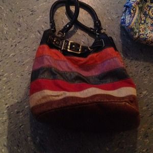 multi colored handbag
