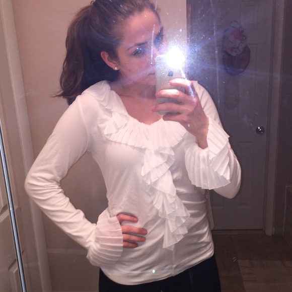 White ruffled top