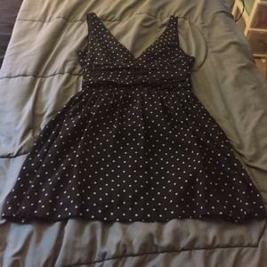 Black dress with light brown polka dots.