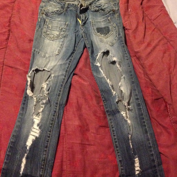 Torn front jeans