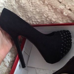 Black heels with black stud spikes