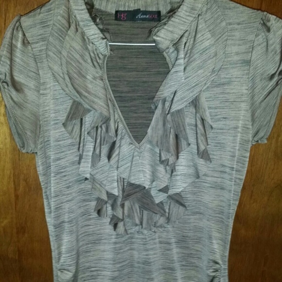 Brown and black ruffled blouse