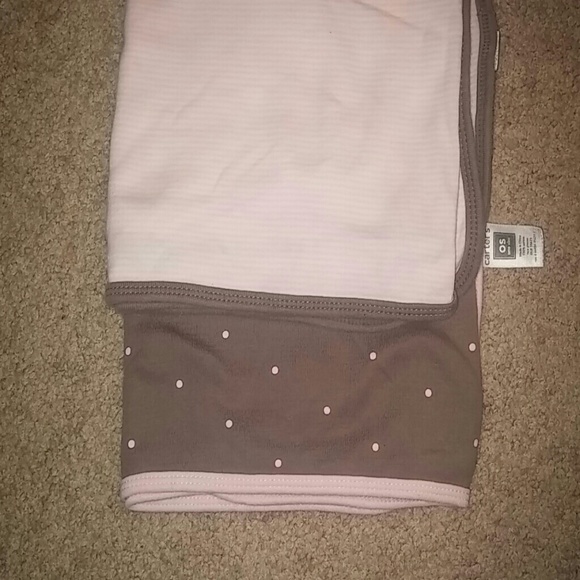 Baby girl receiving blankets