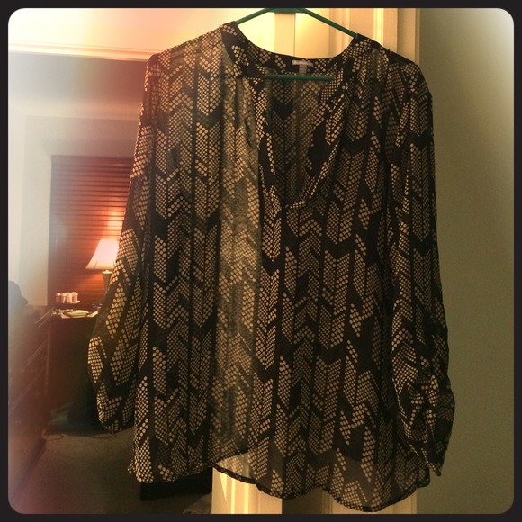 Black chiffon top with beige pattern.