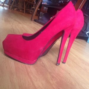 Red peep-toe pumps