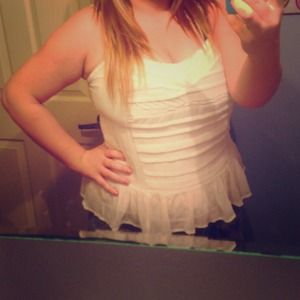 Adorable peplum type shirt