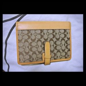 Coach passport holder