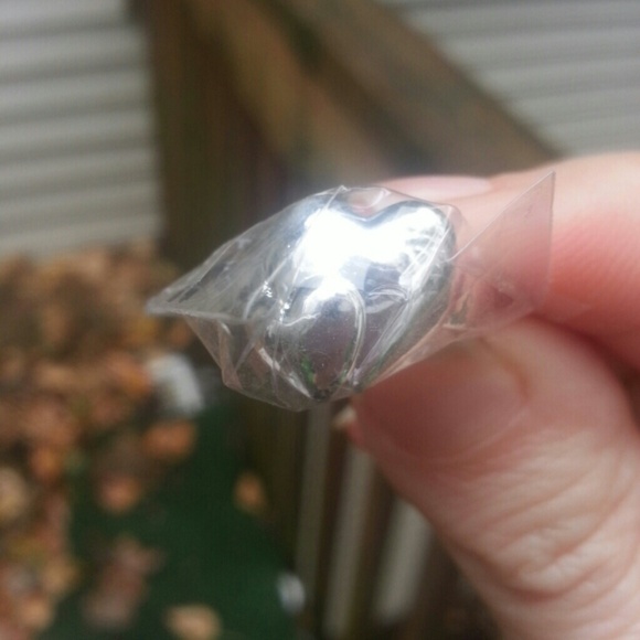 Never worn 925 silver double heart ring