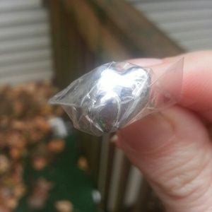 Never worn 925 silver double heart ring