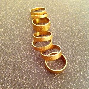 Stack of gold statement rings :)