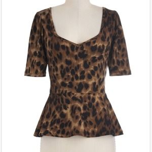 Leopard print 3/4 sleeve v neck peplum top