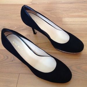 Nine West black suede pumps.