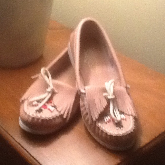 Powder pink Minnetonka moccasins.