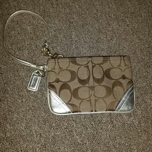 Marked down. Authentic Coach wristlet