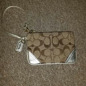 Marked down. Authentic Coach wristlet