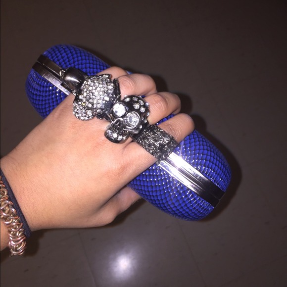 Royal blue knuckle ring clutch