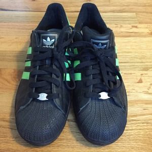 Black and Green Adidas sneakers