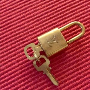 Louie Vuitton Brass Luggage Lock