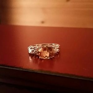 topaz with white gold band & two dimonds .