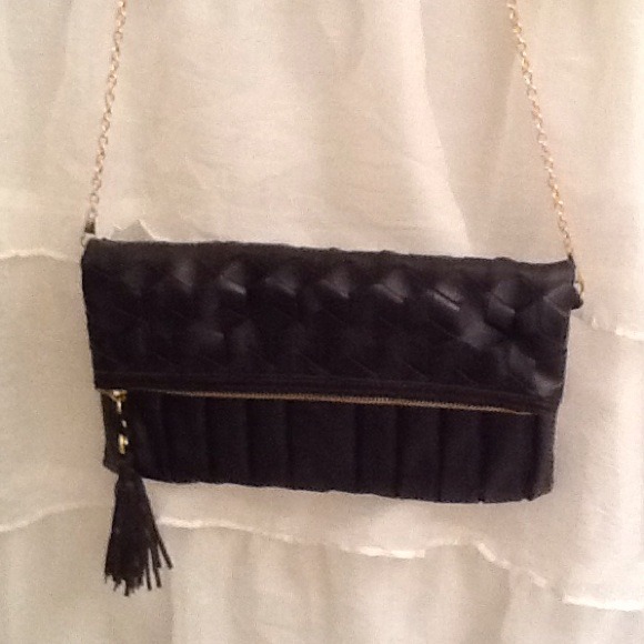 Black woven flap clutch or side purse.