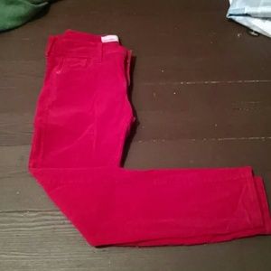 Red corduroy skinny jeans
