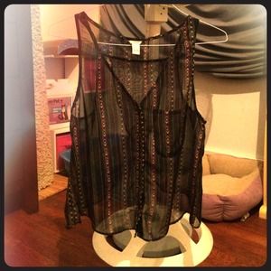Sheer, open back vest top. Tribal print, black