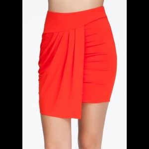 Bebe asym miniskirt -hot red color