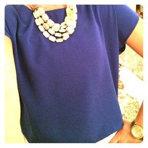 Blue top with button detail down back