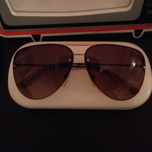 Marc by Marc Jacobs aviator sunglasses.