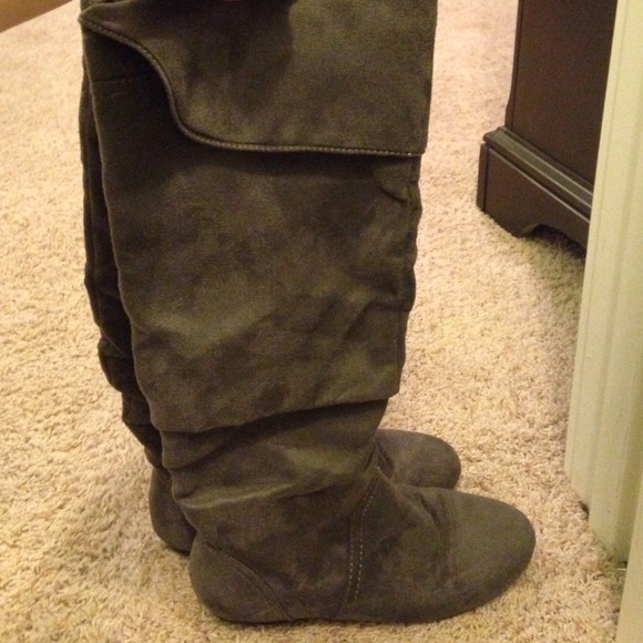 Tall black suede boots