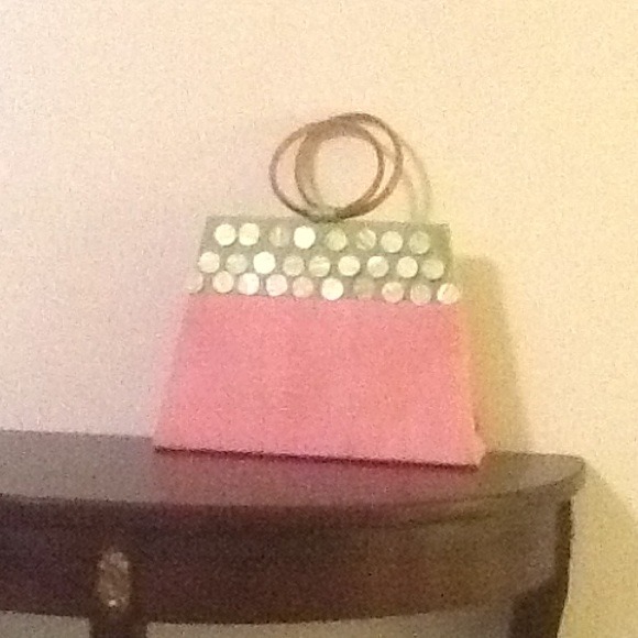 A pink and green resort hand bag