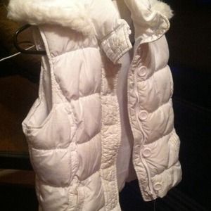 White vest with fur hood