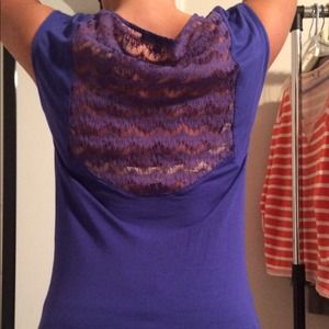 Great top for a night out! The back is super cute