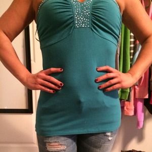 Great top for a night out! Very slimming. Seals in