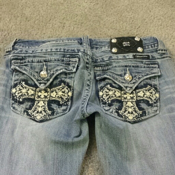 Well loved Miss Me Cross Pocket Boot Cut jeans
