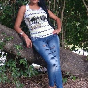 Distressed Butt liftin skinny jeans and vest set