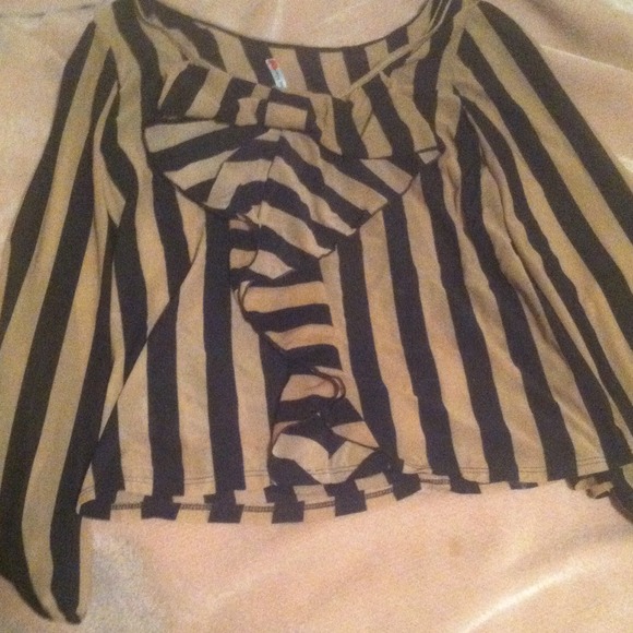 Brown/black shirt, black dress one sleeve