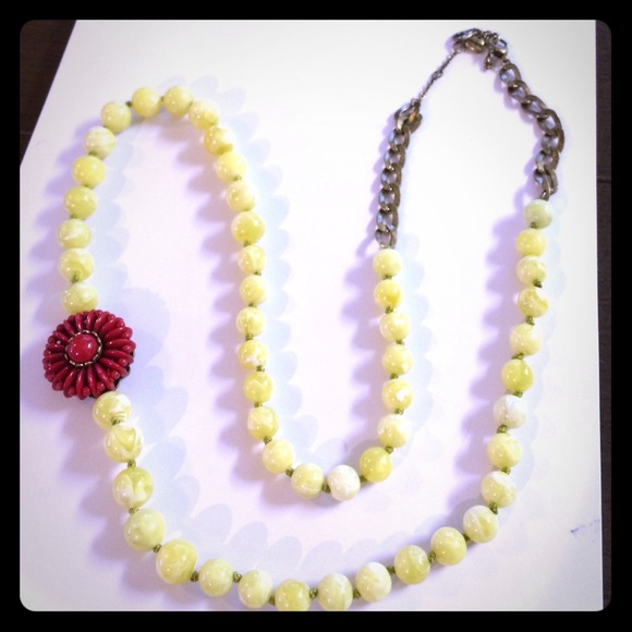 Fossil necklace with red flower