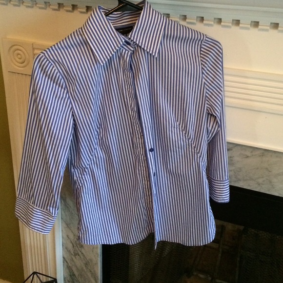 A women's button up dress shirt.