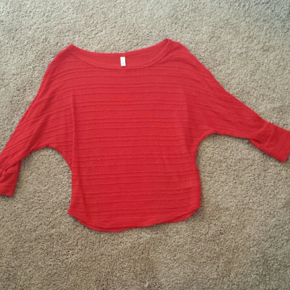 Flowy, red dressy top.
