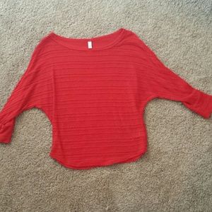 Flowy, red dressy top.